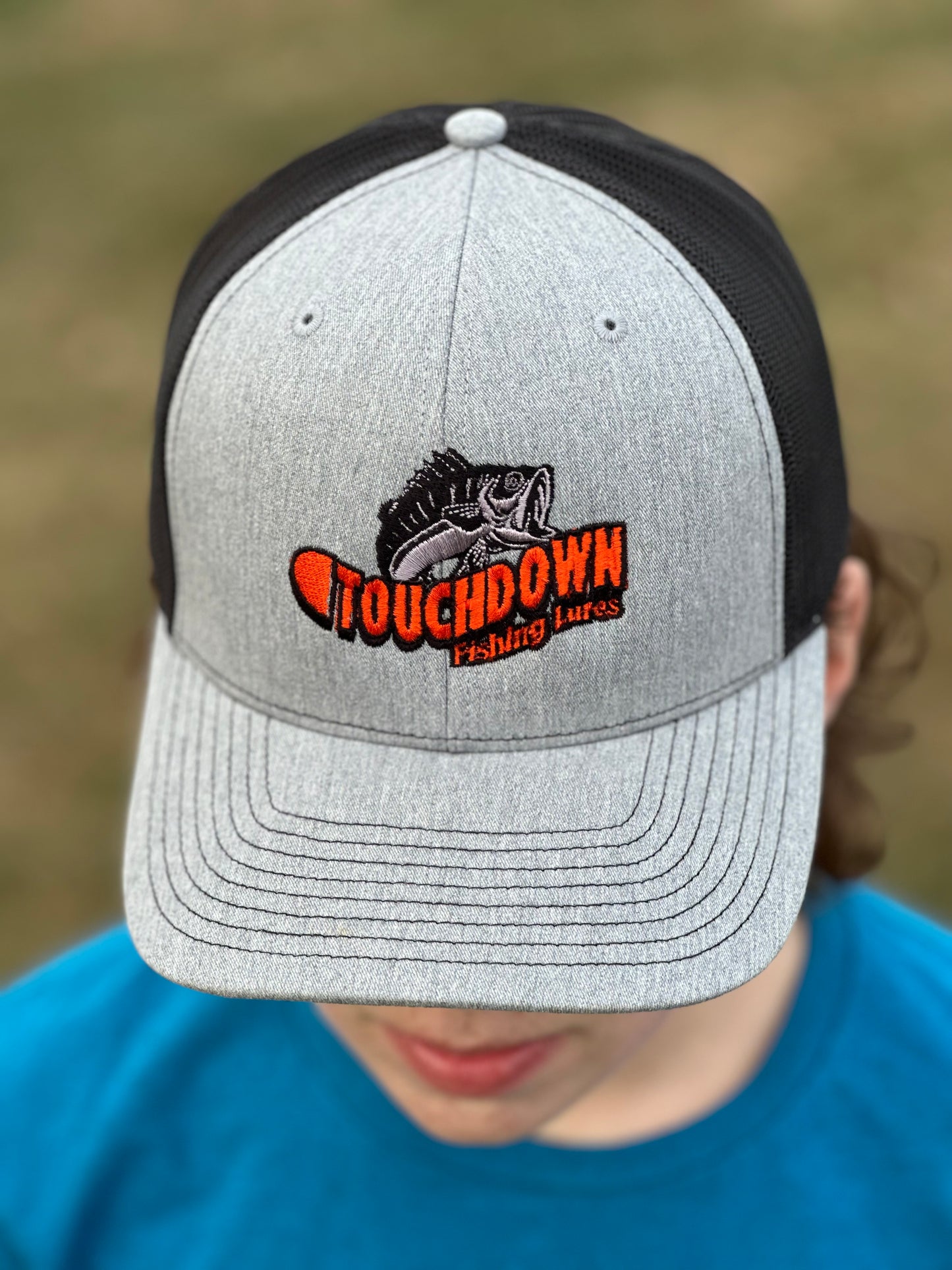 Get your own High quality Richardson heather grey/black mesh Snapback hat. Embroidery on front with the Touchdown Logo.